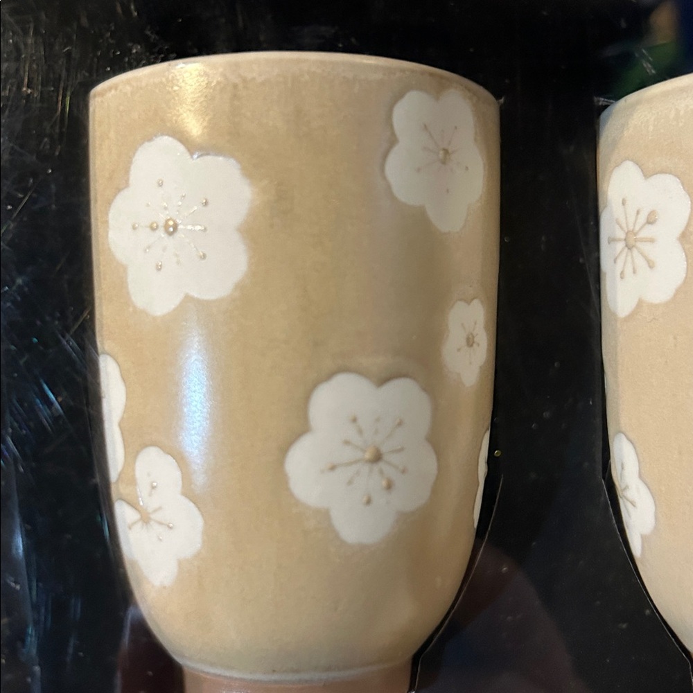 Stoneware floral tea/coffee cups. Durable and easy to handle while sipping!